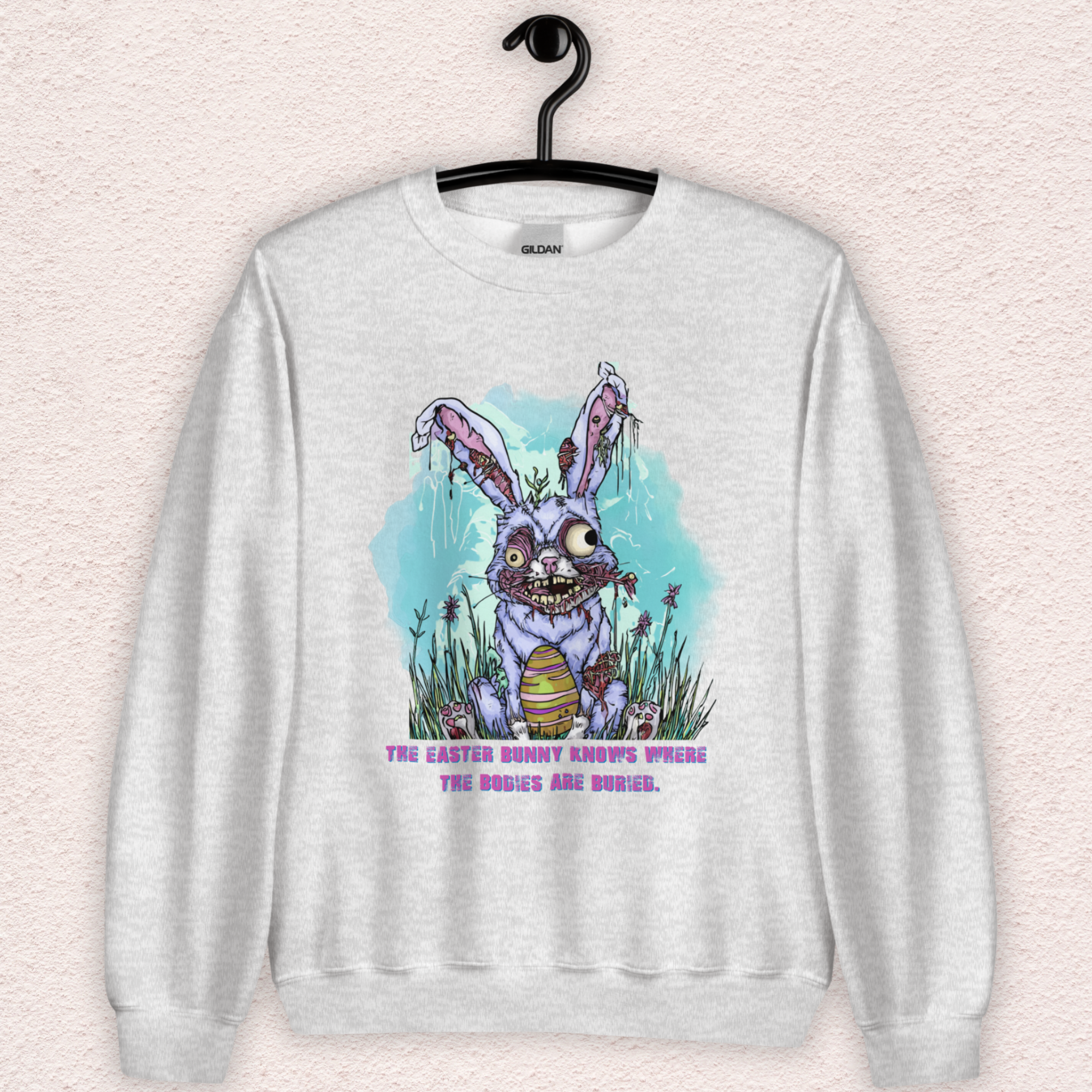 The Easter Bunny Knows Where the Bodies Are Buried Sweatshirt | Zombie Easter Bunny Horror Sweatshirt | Funny Dark Humor Easter | Gildan Crewneck
