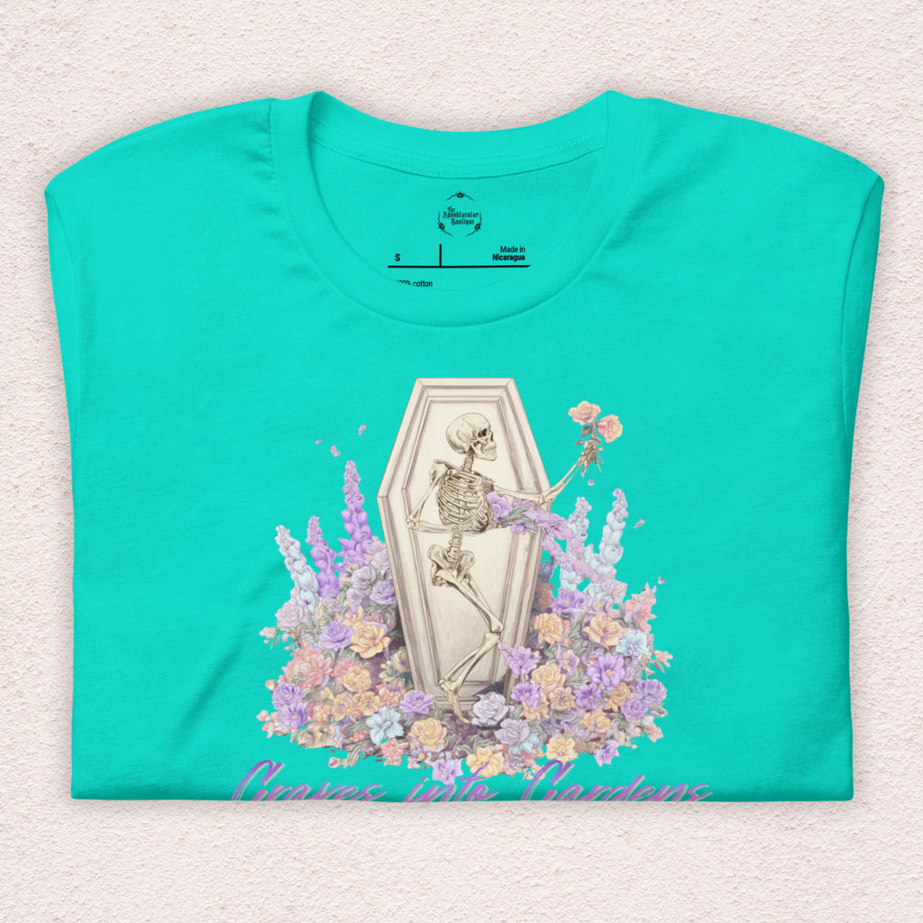 Graves Into Gardens Skeleton Easter Tee | Gothic Faith Spring Shirt | Pastel Floral Resurrection Graphic | Spooky Christian Bella Canvas T-Shirt