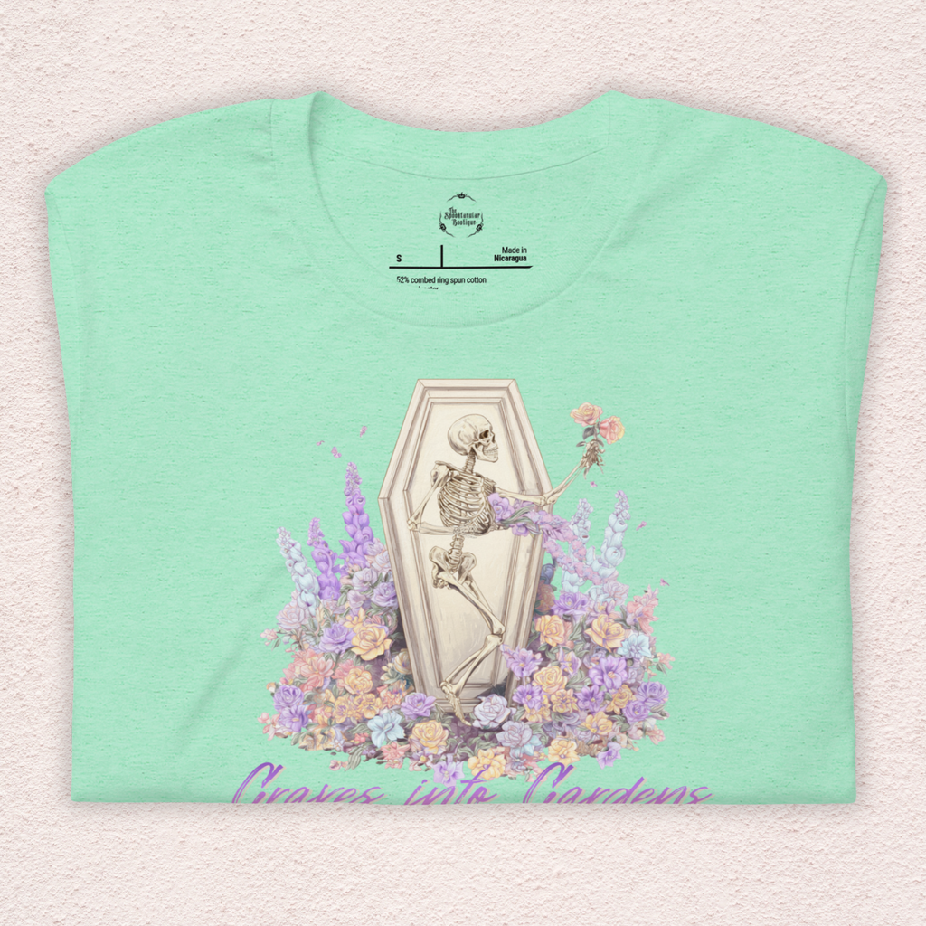 Graves Into Gardens Skeleton Easter Tee | Gothic Faith Spring Shirt | Pastel Floral Resurrection Graphic | Spooky Christian Bella Canvas T-Shirt
