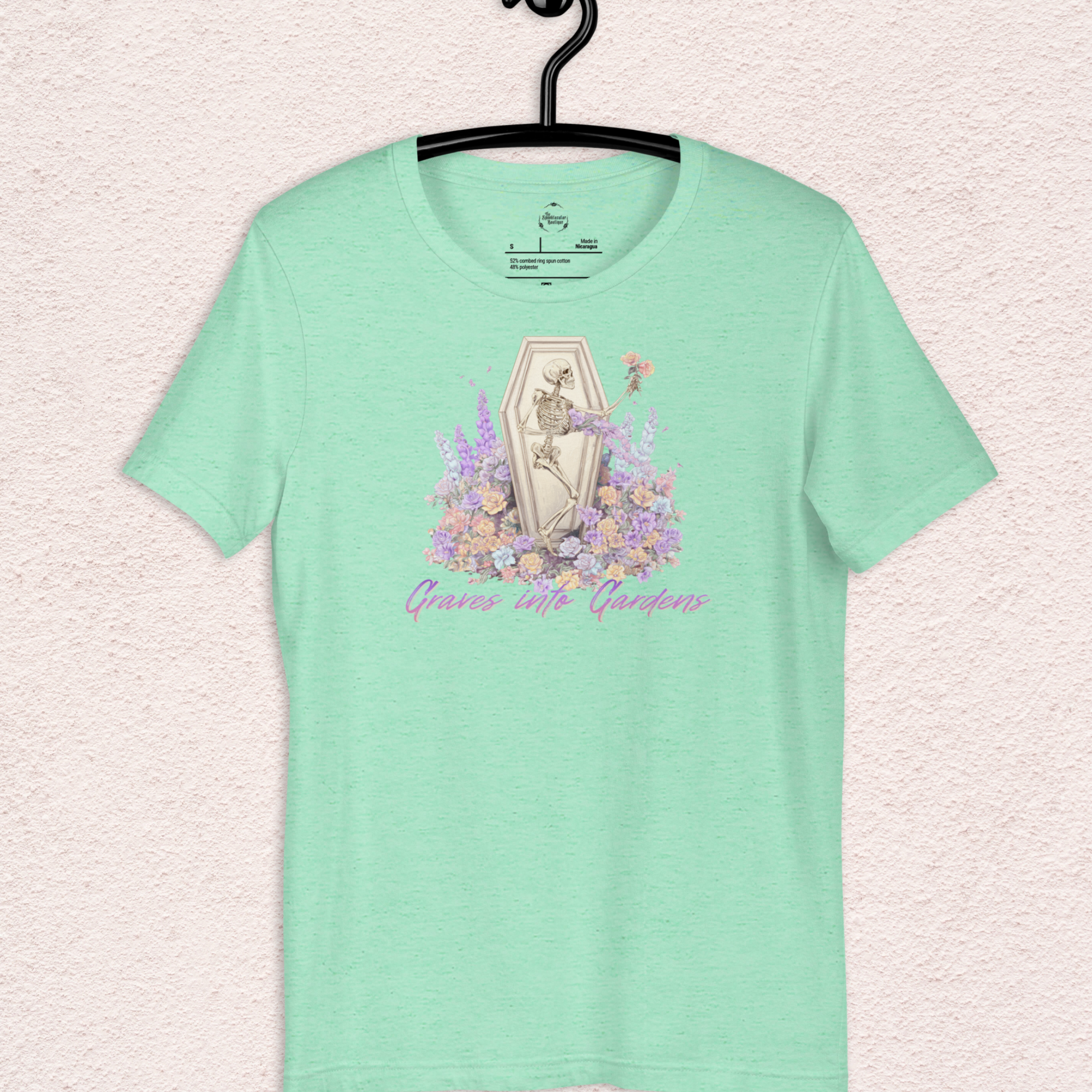 Graves Into Gardens Skeleton Easter Tee | Gothic Faith Spring Shirt | Pastel Floral Resurrection Graphic | Spooky Christian Bella Canvas T-Shirt